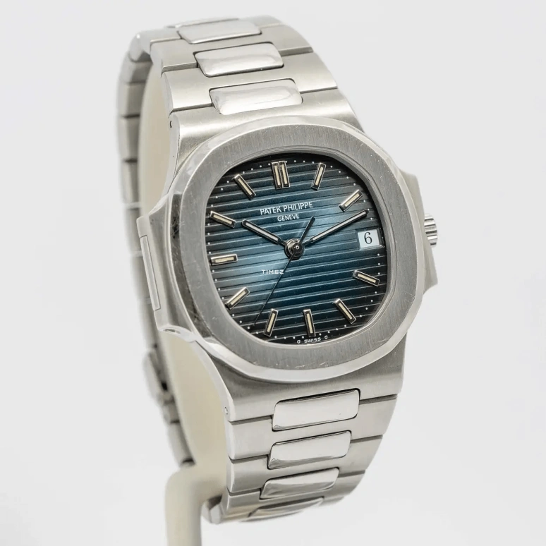 Patek Philippe,Nautilus 34mm,34mm,Stainless Steel,Black,Automatic,Day,In-house Caliber,3800,3800/1A-010