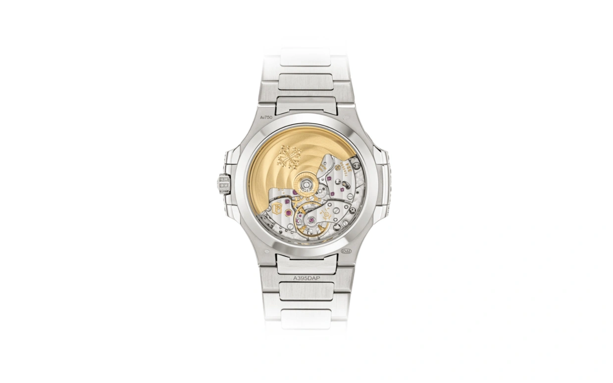 Patek Philippe,Nautilus 35.20mm,35.20mm,White Gold,Silver White,Automatic,45hours,In-house Caliber,7118,7118/1451G-001