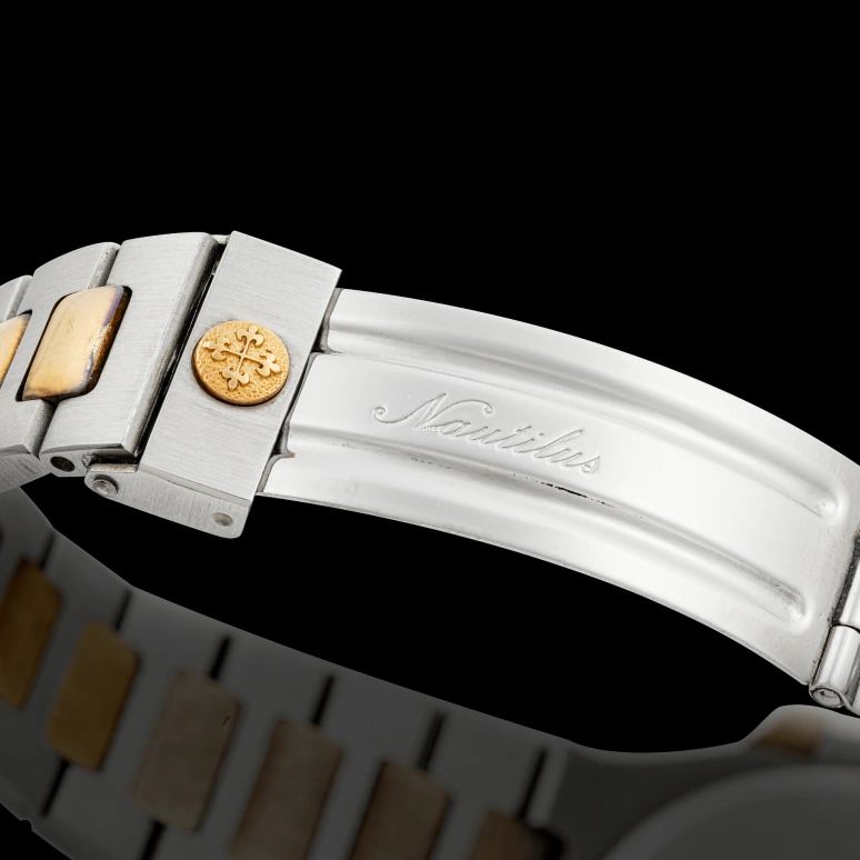 Patek Philippe,Nautilus 37.50mm,37.50mm,Stainless Steel,Gold,Automatic,Day,In-house Caliber,3800,3800/001JA