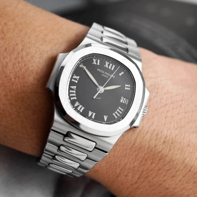 Patek Philippe,Nautilus 37mm,37mm,Stainless Steel,Black,Automatic,Day,In-house Caliber,3800,3800/1A-001
