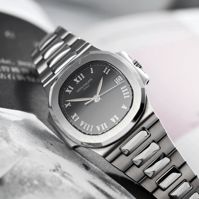 Patek Philippe,Nautilus 37mm,37mm,Stainless Steel,Black,Automatic,Day,In-house Caliber,3800,3800/1A-001