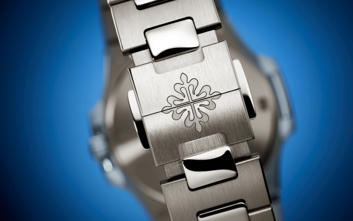 Patek Philippe,Nautilus 32mm,32mm,White Gold,Sky Blue,Quartz,Day,In-house Caliber,7010,7010/1G-013
