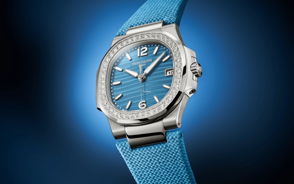 Patek Philippe,Nautilus 32mm,32mm,White Gold,Sky Blue,Quartz,Day,In-house Caliber,7010G,7010G-013