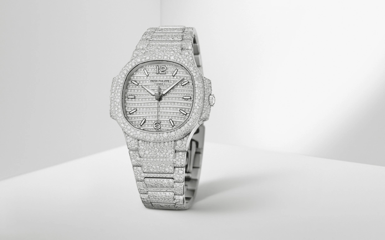 Patek Philippe,Nautilus 35.20mm,35.20mm,White Gold,Silver,White,Automatic,45hours,In-house Caliber,Victoria Beckham,Posh Spice,7118,7118/1450G-001