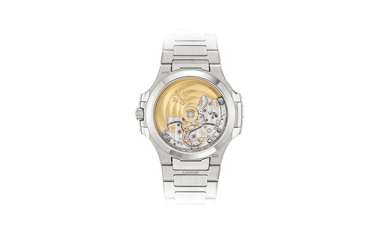 Patek Philippe,Nautilus 35.20mm,35.20mm,White Gold,Silver White,Automatic,45hours,In-house Caliber,7118,7118/1453G-001