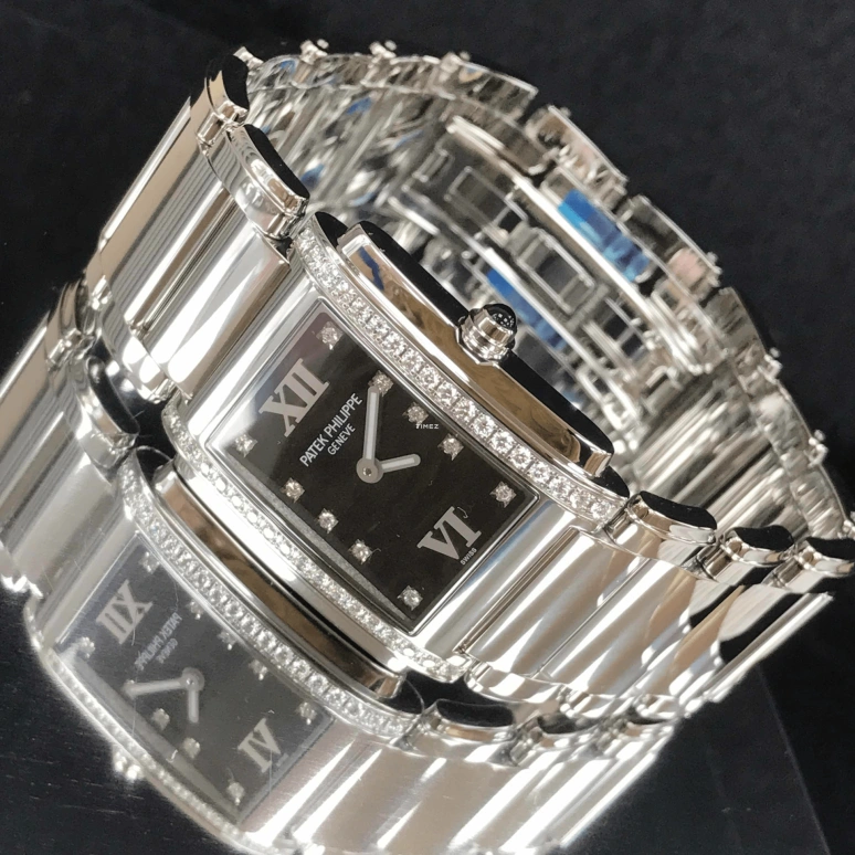 Patek Philippe,Twenty~4 25x30mm,25x30mm,Stainless Steel,Black,Quartz,In-house Caliber,Sapphire,4910,4910/10A-001