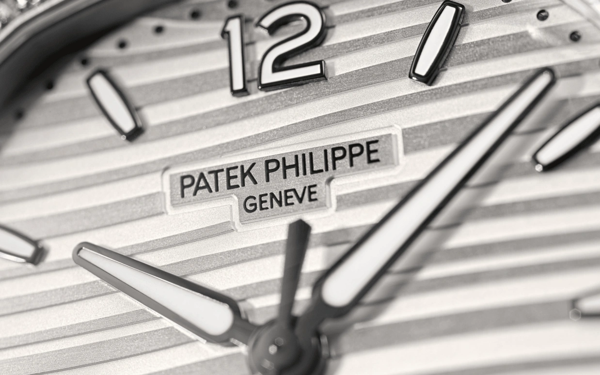 Patek Philippe,Nautilus 35.20mm,35.20mm,Stainless Steel,White,Automatic,Day,45hours,7118,7118/1200A-010