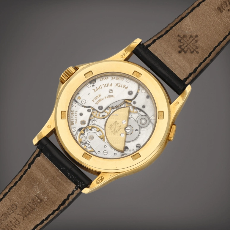 Patek Philippe,Complications 37mm,37mm,Yellow Gold,Silver White,Automatic,World Time,Day / Night Indication,5110J,5110J-001