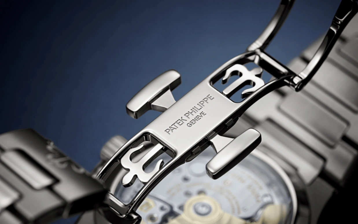 Patek Philippe,Nautilus 35.20mm,35.20mm,Stainless Steel,White,Automatic,Day,45hours,7118,7118/1200A-010