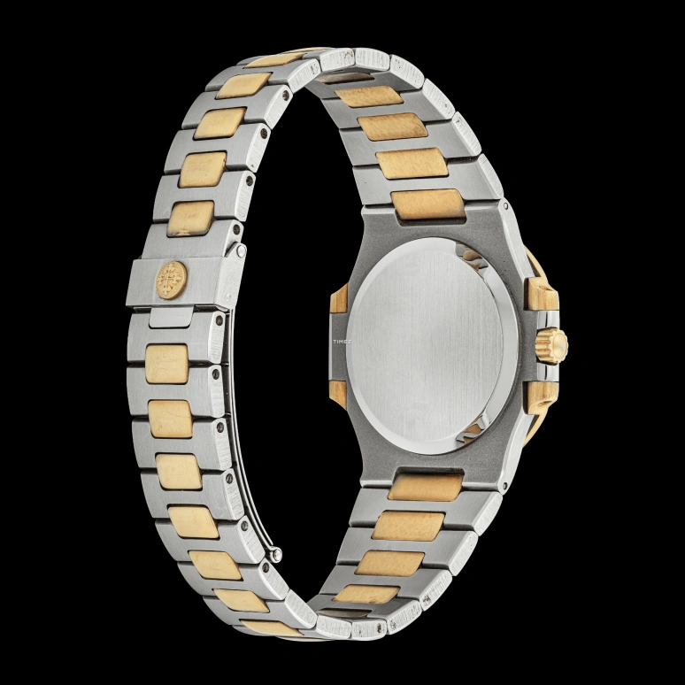 Patek Philippe,Nautilus 37.50mm,37.50mm,Stainless Steel,Gold,Automatic,Day,In-house Caliber,3800,3800/001JA