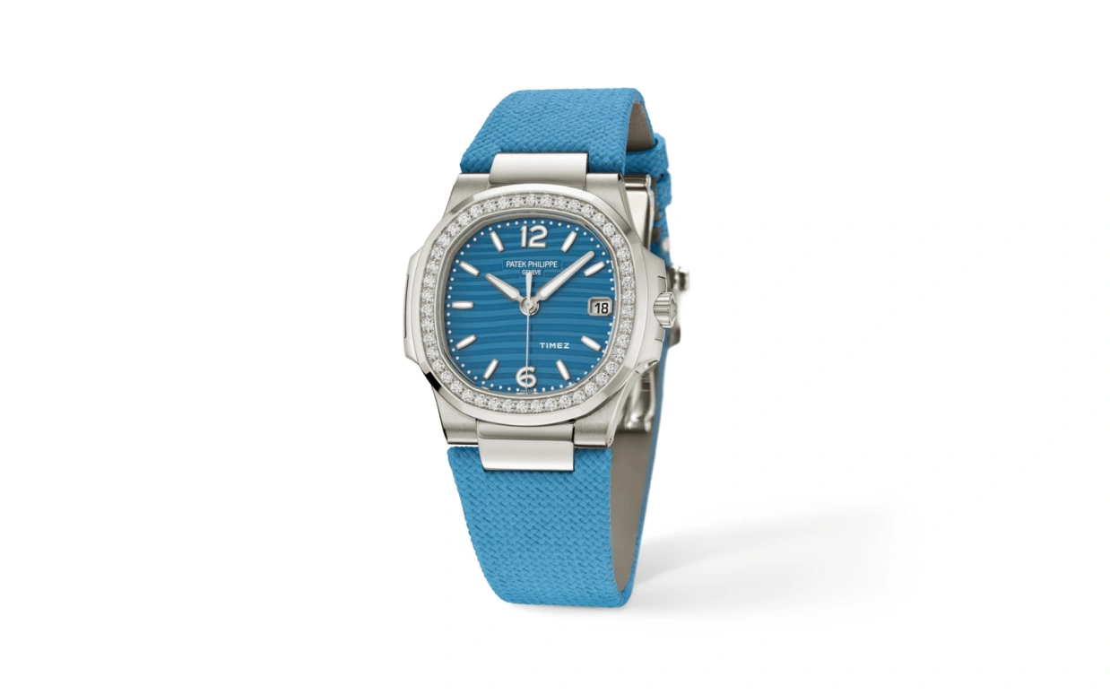 Patek Philippe,Nautilus 32mm,32mm,White Gold,Sky Blue,Quartz,Day,In-house Caliber,7010G,7010G-013