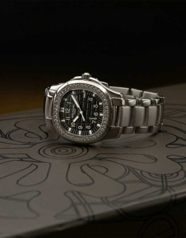 Patek Philippe,Aquanaut 35.20mm,35.20mm,Stainless Steel,Black,Quartz,Day,In-house Caliber,5087,5087/1A-001