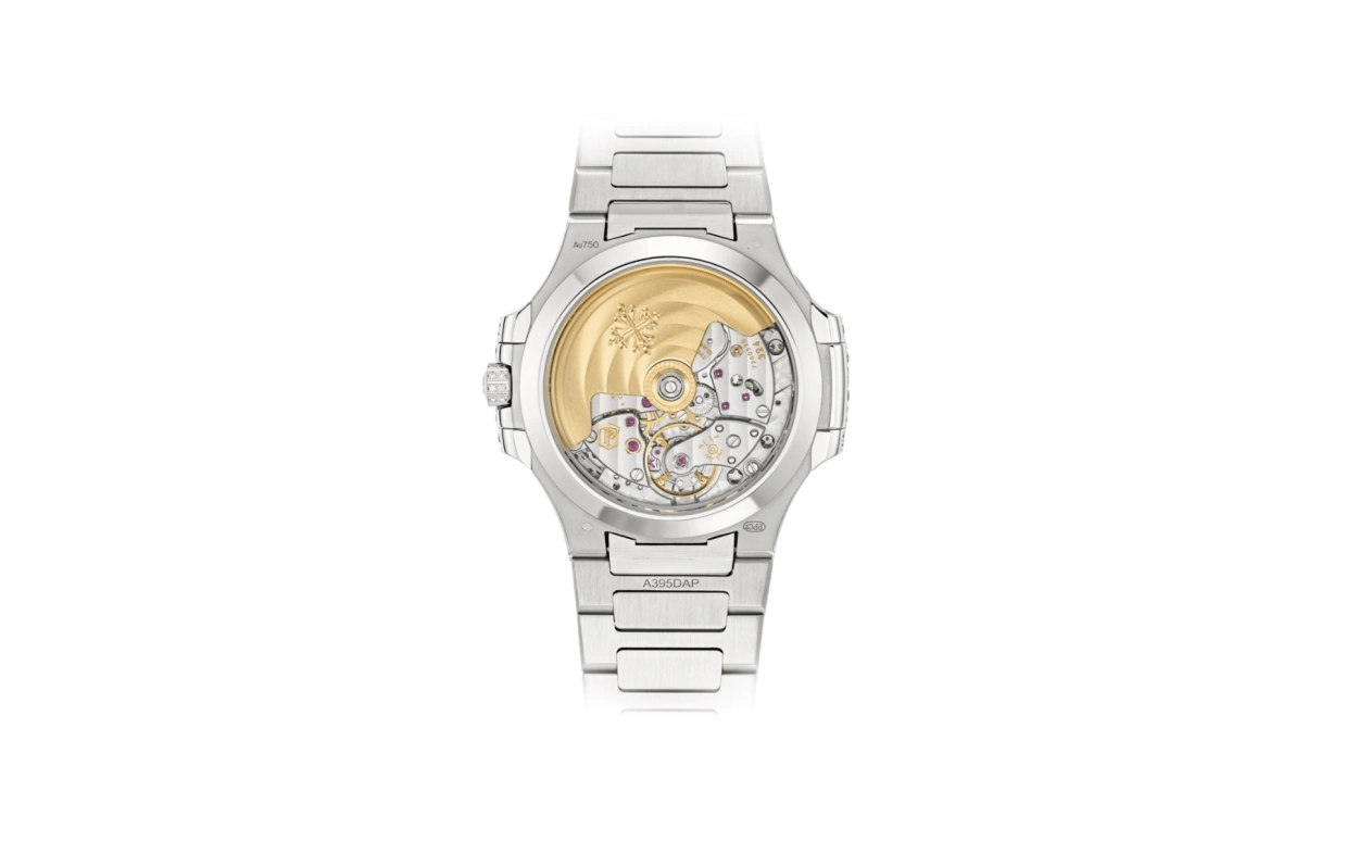 Patek Philippe,Nautilus 35.20mm,35.20mm,White Gold,Silver,White,Automatic,45hours,In-house Caliber,Victoria Beckham,Posh Spice,7118,7118/1450G-001