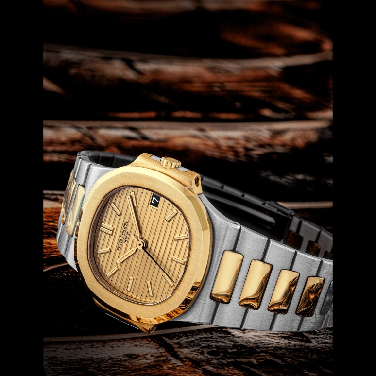 Patek Philippe,Nautilus 37.50mm,37.50mm,Stainless Steel,Gold,Automatic,Day,In-house Caliber,3800,3800/001JA