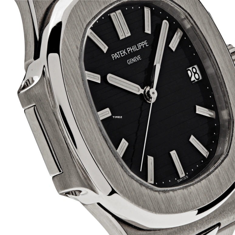 Patek Philippe,Nautilus 37mm,37mm,White Gold,Black,Automatic,Day,In-house Caliber,3711,3711/1G-001