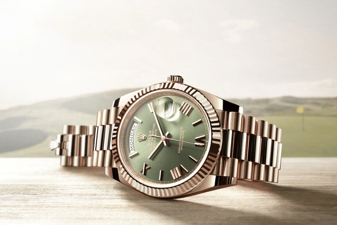Rolex,Day-Date 40 40mm,40mm,Rose Gold,Green,Automatic,Date,Day,Carmelo Anthony,LeBron James,228235,228235-0025