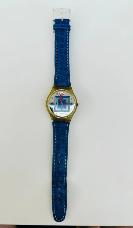 Swatch,Other 34mm,34mm,Plastic,Silver,Quartz,Day,Sapphire,Crystal Glass,GN144