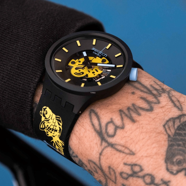Swatch,Other 47mm,47mm,Bioceramic,Black,Yellow,Skeleton,Quartz,Sapphire,Crystal Glass,Round,SB03B109C