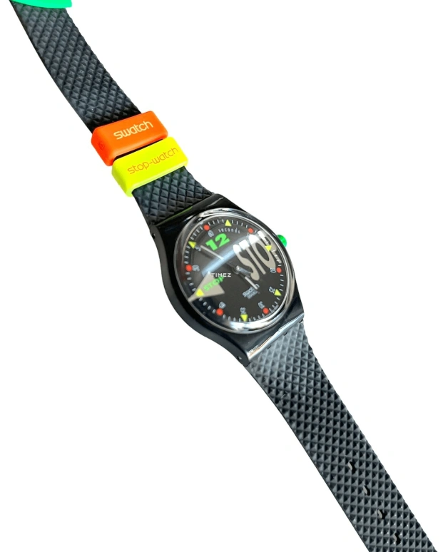 Swatch,Other 34mm,34mm,Plastic,Black,Quartz,Sapphire,Crystal Glass,Tonneau,SSB101