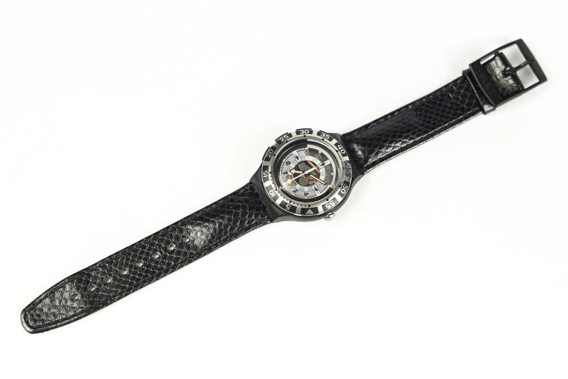 Swatch,Other 38mm,38mm,Plastic,Skeleton,Silver,Quartz,Sapphire,Round,SDB104