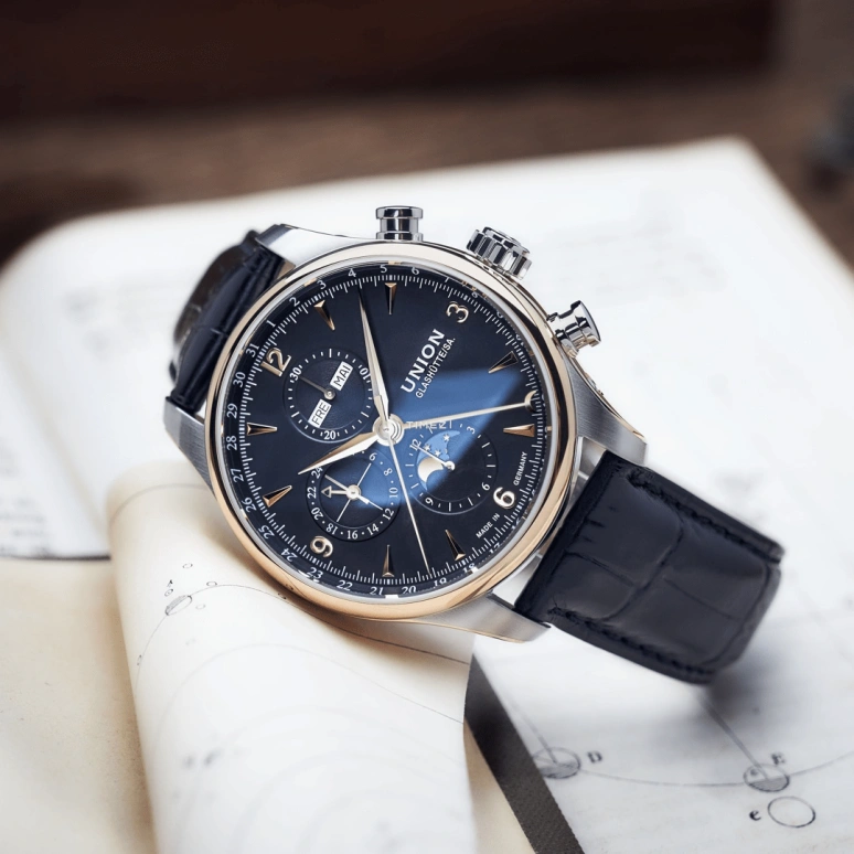 UNION,BELISAR 44mm,44mm,Stainless Steel,Stainless Steel,Black,Automatic,Chronograph,Moonphase,Month,Date,Sapphire,Glass,Rose Gold,D904,D904.425.46.057.11